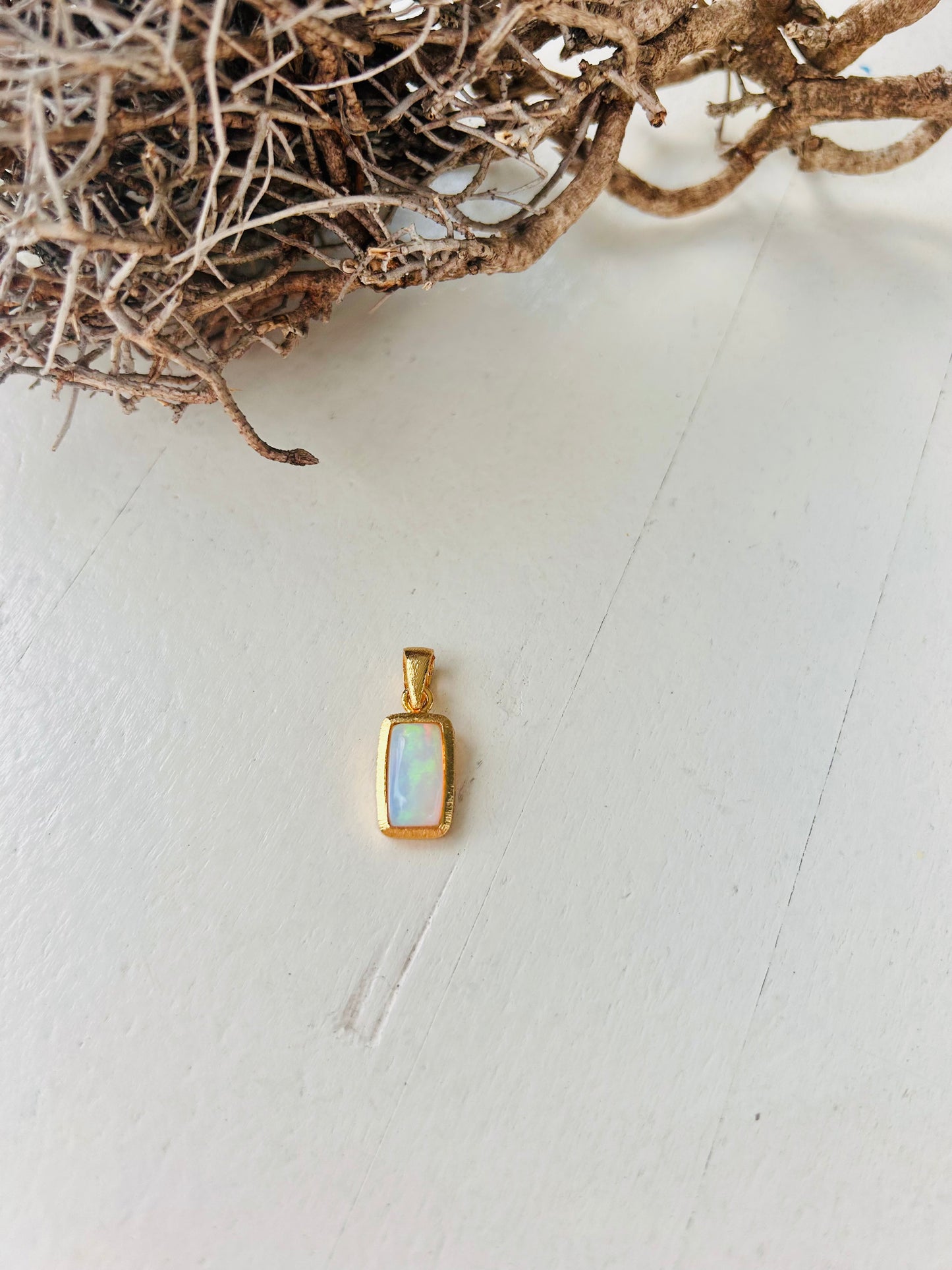 Pendentifs en opale – quatre pièces uniques