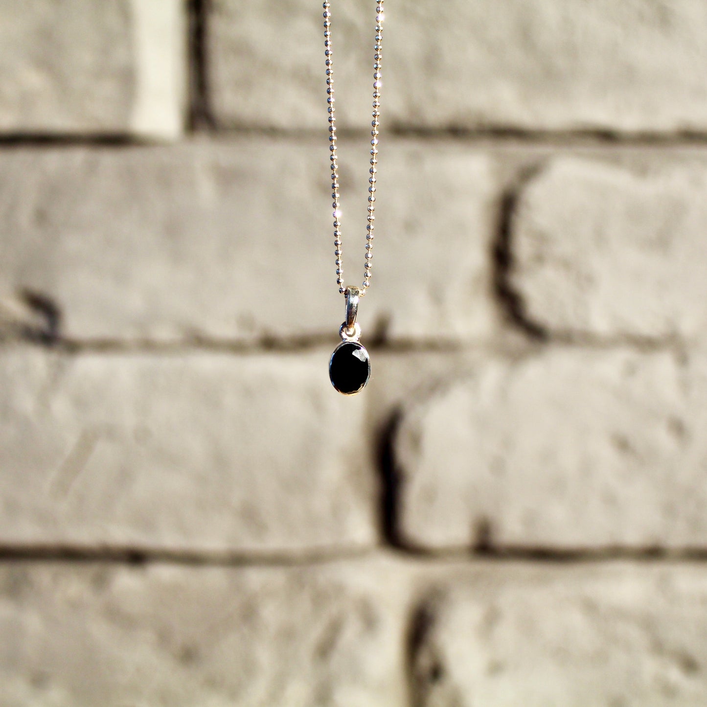 Pendentif en onyx, argent 925 | Or 24 carats | Édition limitée