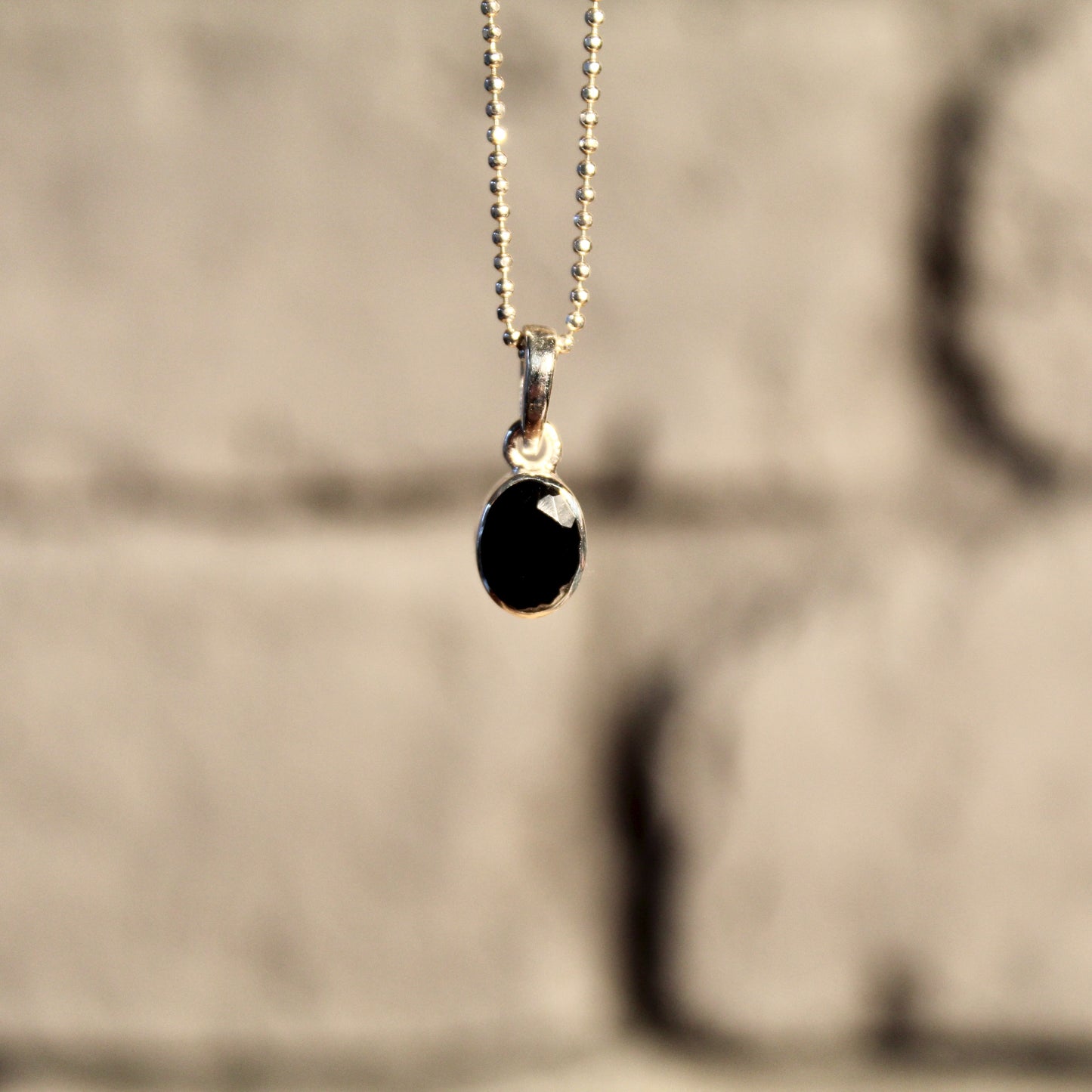 Pendentif en onyx, argent 925 | Or 24 carats | Édition limitée