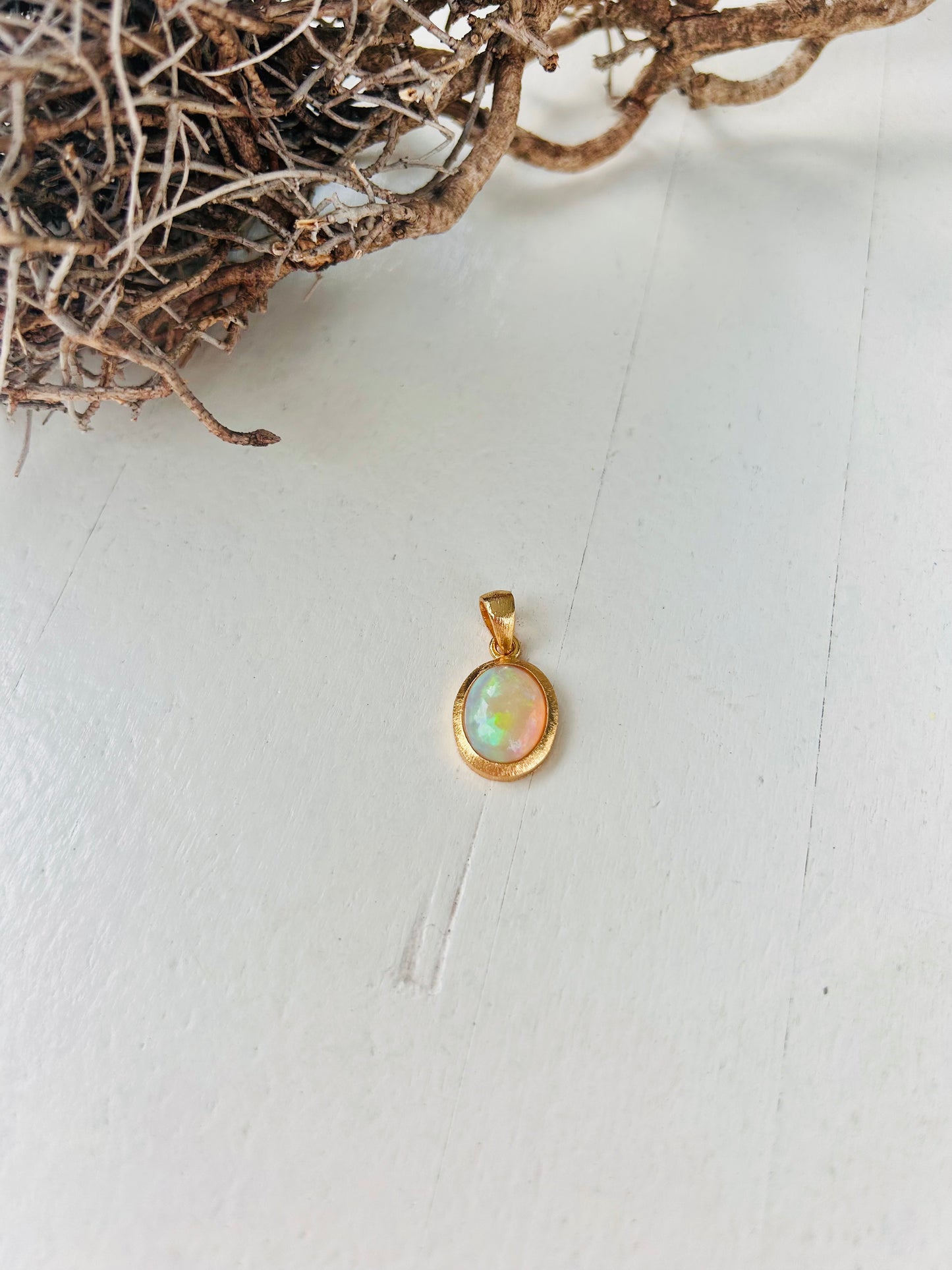 Pendentifs en opale – quatre pièces uniques