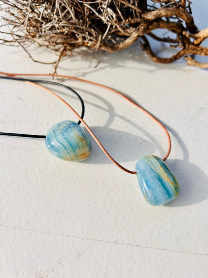 Aragonit Trommelstein gebohrt