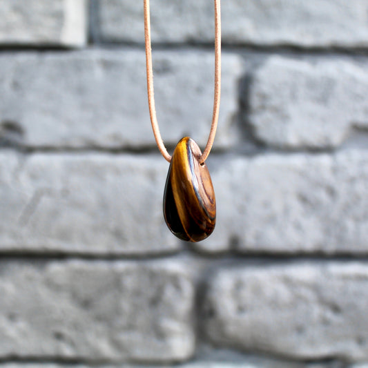 Pierre roulée œil de tigre percée